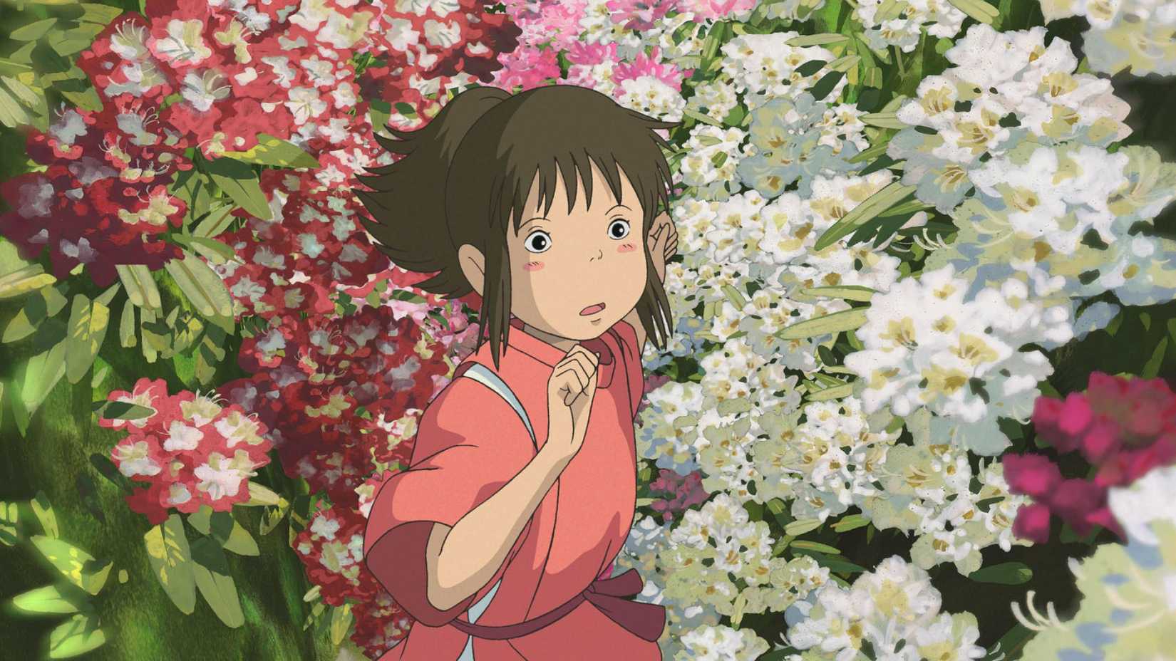 Studio Ghibli protagonist Chihiro runs through flowers in Spirited Away