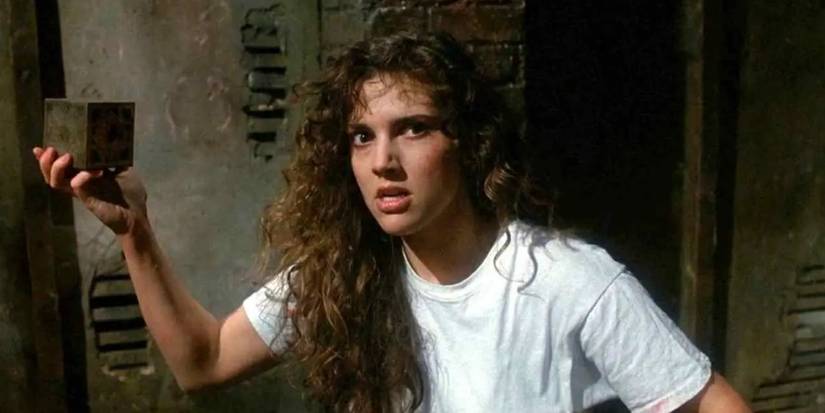 Kirsty (Ashley Laurence) holds the Lament Configuration in Hellraiser.