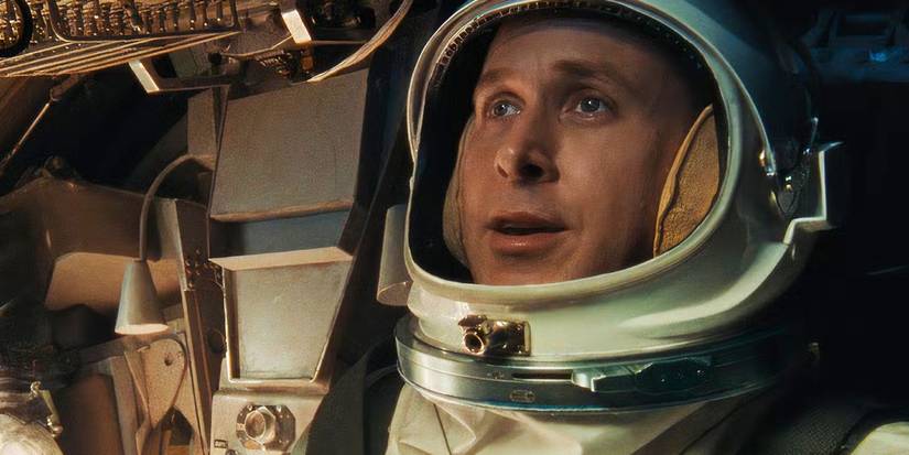 Neil Armstrong by Ryan Gosling in a space costume, looking in space