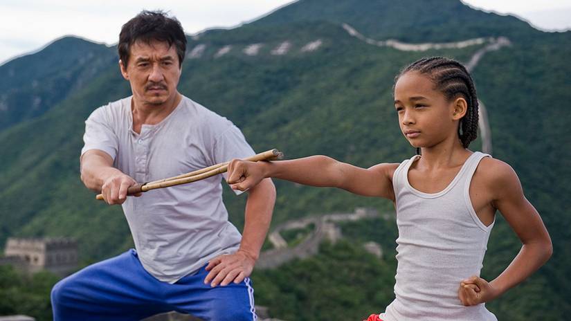 Mr. Han (Jackie Chan) training Dre Parker (Jaden Smith) in The Karate Kid (2010).