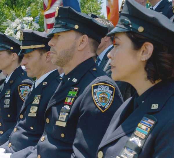 The Reagan family in NYPD uniform attending Luis Badillo's funeral in Blue Bloods series finale