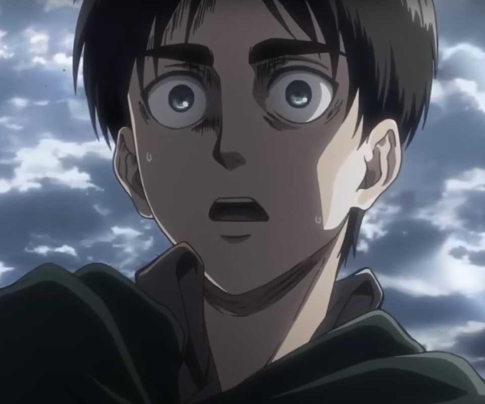 Eren Yeager looks shocked against a cloudy sky in Attack on Titan.