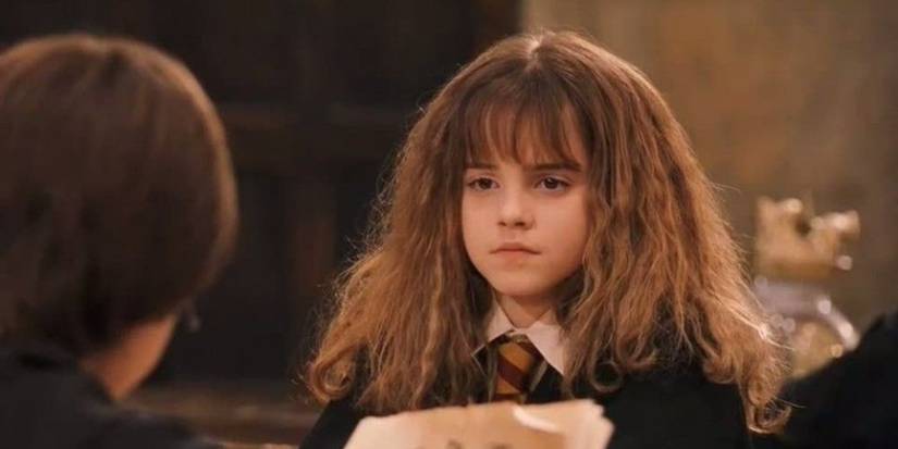 Hermione Granger looks at Harry Potter with a condescending expression.