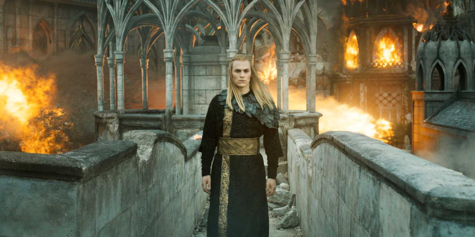 Sauron (Charlie Vickers) walks through the ruins of Eregion in The Lord of the Rings: The Rings of Power.