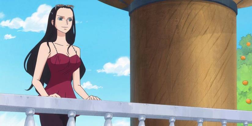 Nico Robin has her hands resting on the railing of the Thousand Sunny while looking into the distance with a smile following the Zou arc in One Piece.