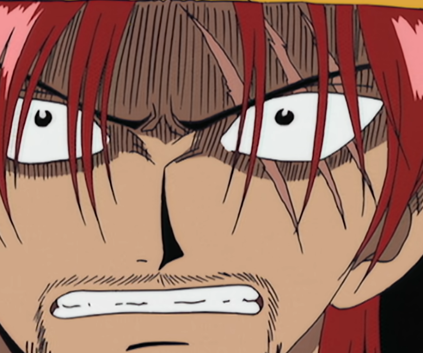 Shanks is glaring at the leader of the Mountain Bandits and threatens him in One Piece.