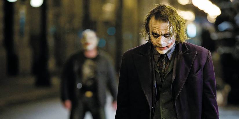 The Joker Eggs Batman in the middle of a street battle between them in The Dark Knight.