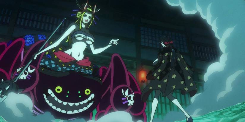 Black Maria points at Nico Robin as she towers over the Straw Hat Pirate during the Raid on Onigashima