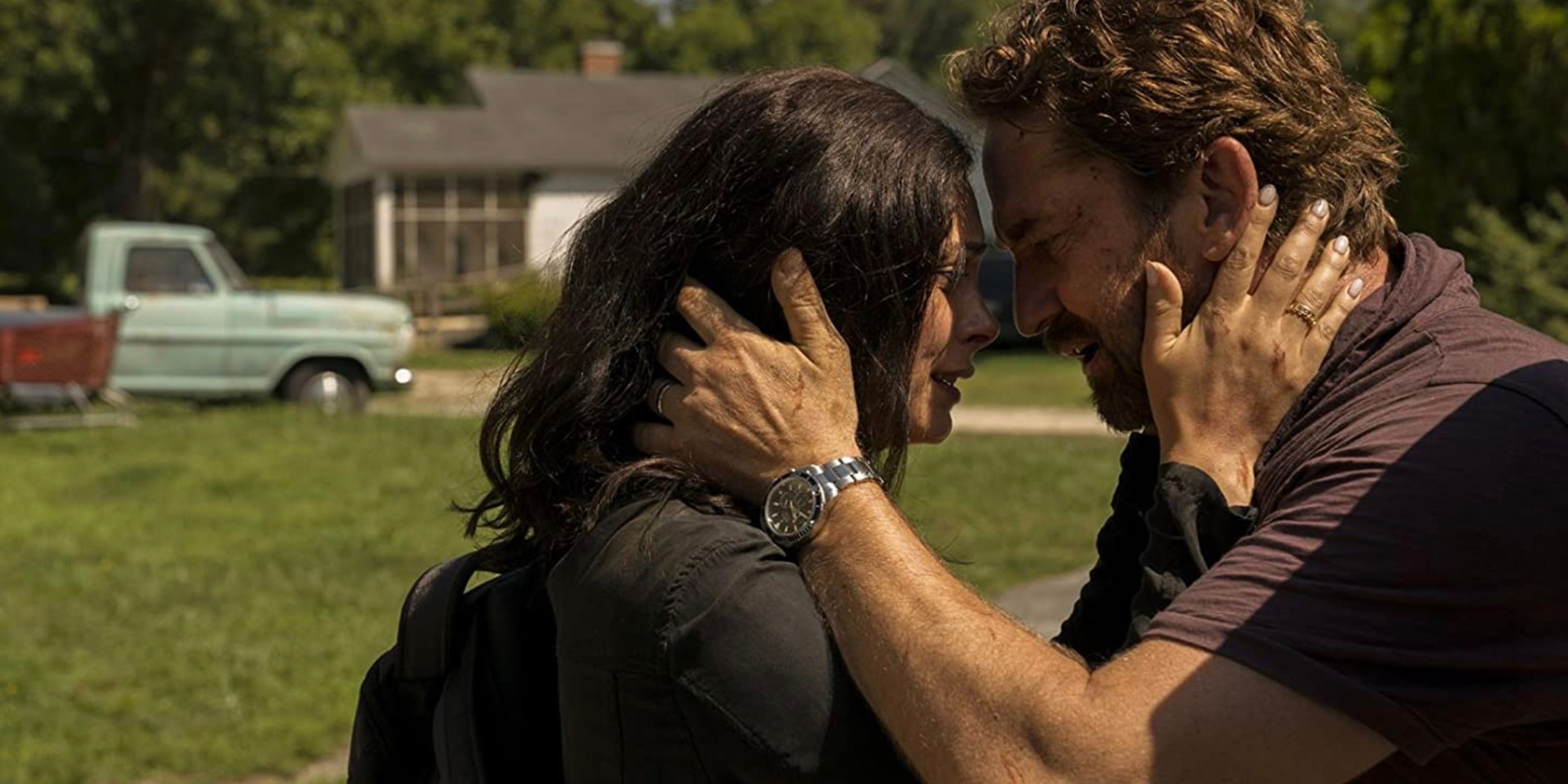 Allison and John Garrity holding each other in Greenland