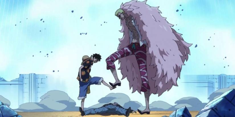 Luffy arrête le pied de Doflamingo dans One Piece