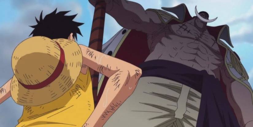 Whitebeard looms over Monkey D. Luffy as they meet during One Piece's Marineford Arc.