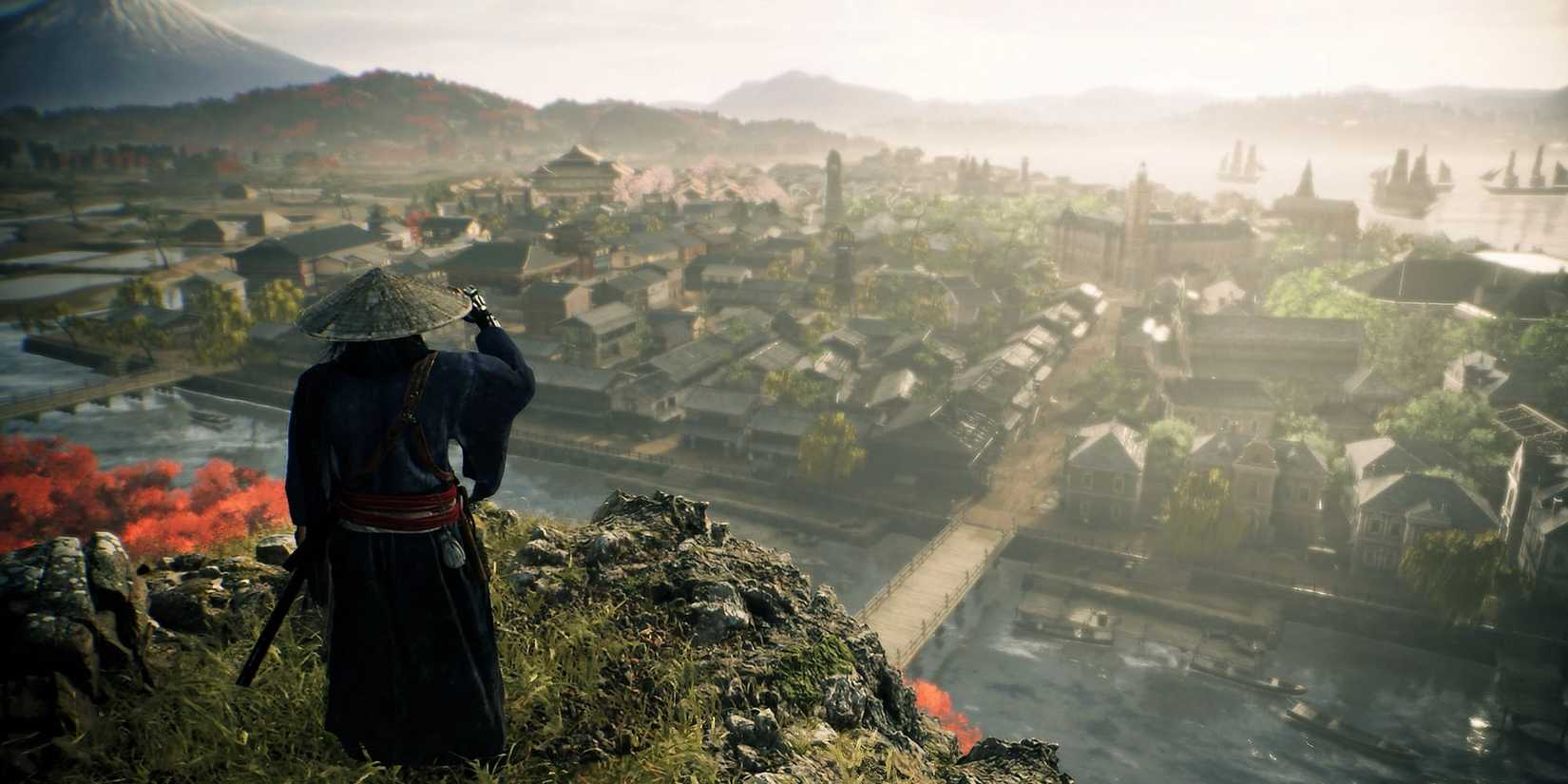 Rise of the Ronin with a ronin standing over a vista of a Japanese town