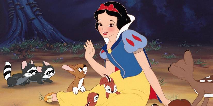 Snow White is surrounded by woodland animals in Snow White and the Seven Dwarfs