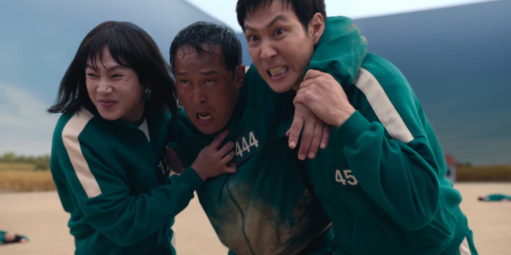 Squid Game's Gi-hun and Hyun-ju help wounded Player 444 across the finish line