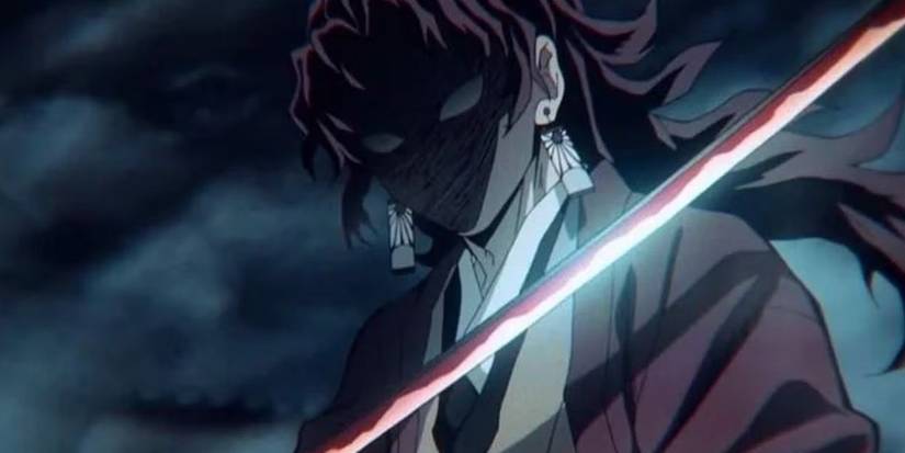 Yoriichi Tsugikuni holds his sword up in the Demon Slayer anime