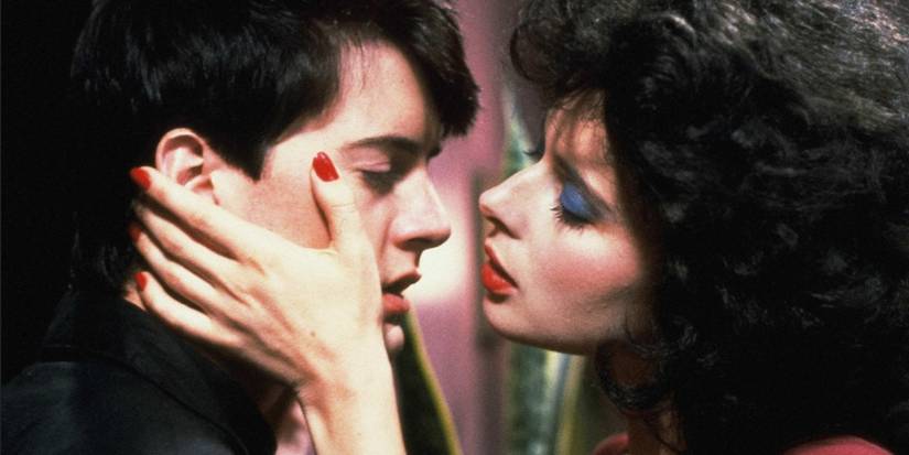 Dorothy (Isabella Rossellini) holds Jeffrey's (Kyle MacLachlan) face in Blue Velvet.