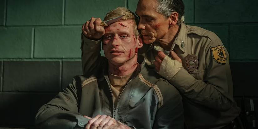 Joe Leaphorn threatens Colton Wolf with a knife on Dark Winds