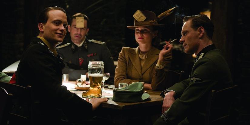 Michael Fassbender as Lieutenant Archie Hicox, Diane Kruger as Bridget von Hammersmark, August Diehl as SS. Dieter Hellstrom and Gedeon Burkhard officer as a corporal Wilhelm Wicki in an Inglourious Basterds bar