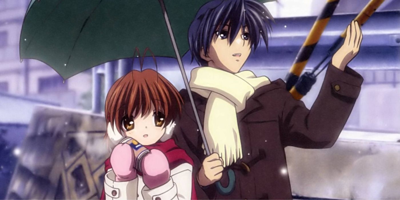 Nagisa e Tomoya de Clannad estão caminhando juntas sob um guarda-chuva enquanto neva.