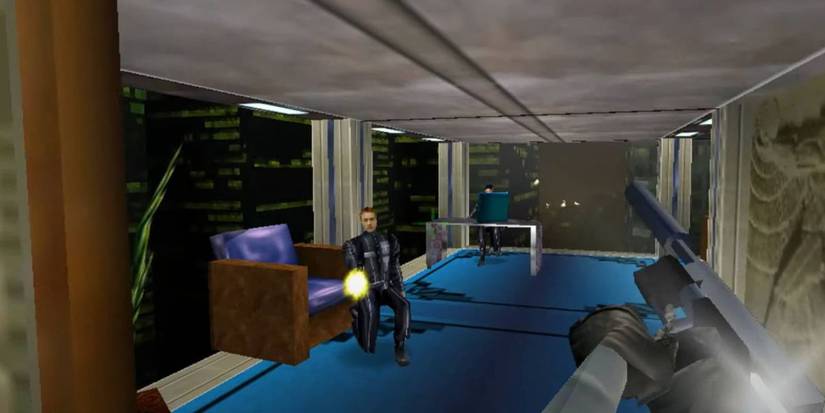 Joanna Dark fires her way through an office in Perfect Dark (N64)