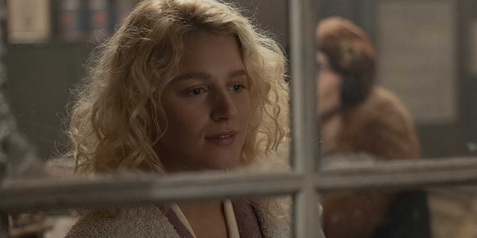 Alexandra Dutton stares out a frosted window in 1923