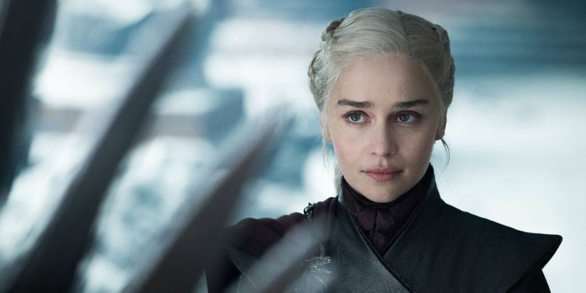 Emilia Clarke as Daenerys Targaryen looking at the Iron Throne from the TV show Game of Thrones
