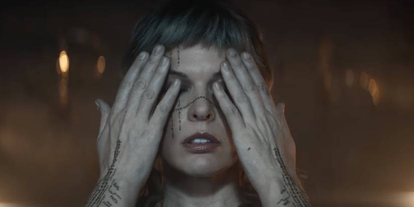 Grey Alys covering her eyes in In the Lost Lands