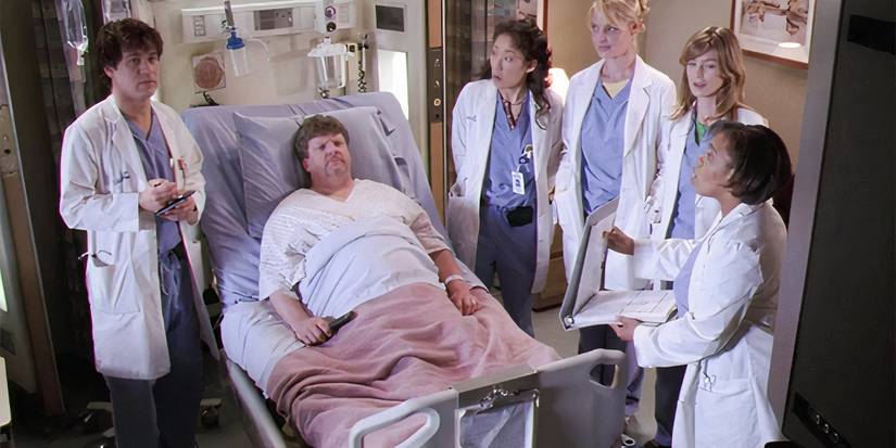 A patient named Henry watching porn to ease his pain while george, izzy, cristina, meredith, and bailey look at him