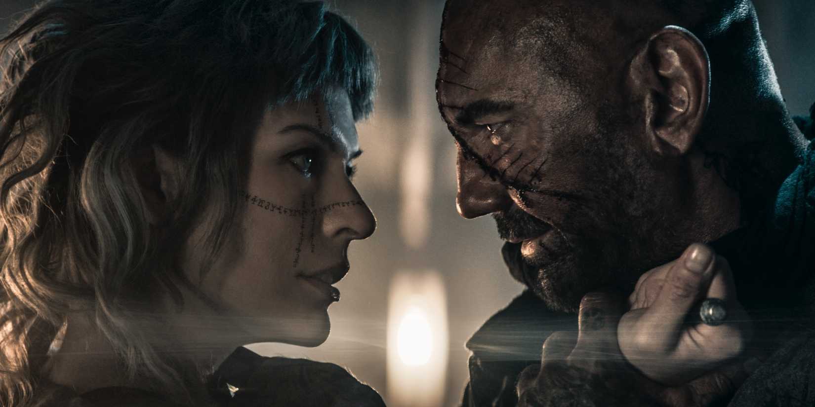 Grey Alys and Boyce fighting each other in the movie In the Lost Lands