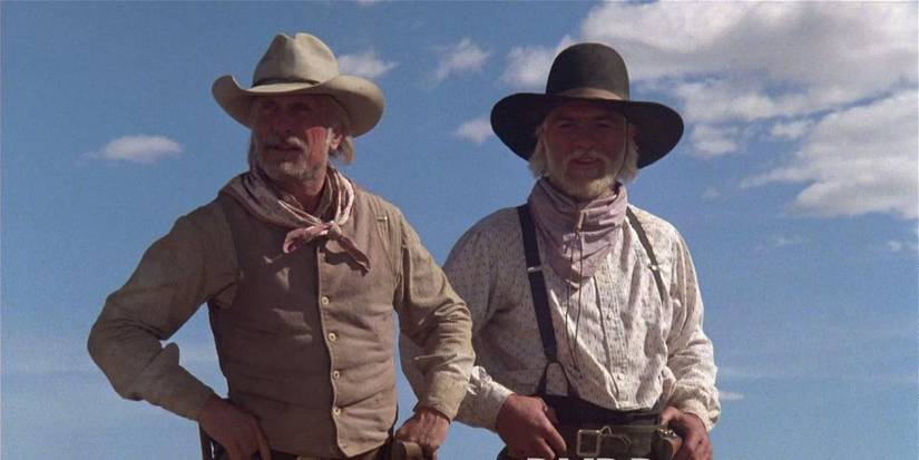 Robert Duvall as Captain Auguste "Gus" McCrae and Tommy Lee Jones as Captain Woodrow F. Call from the Lonesome Dove miniseries