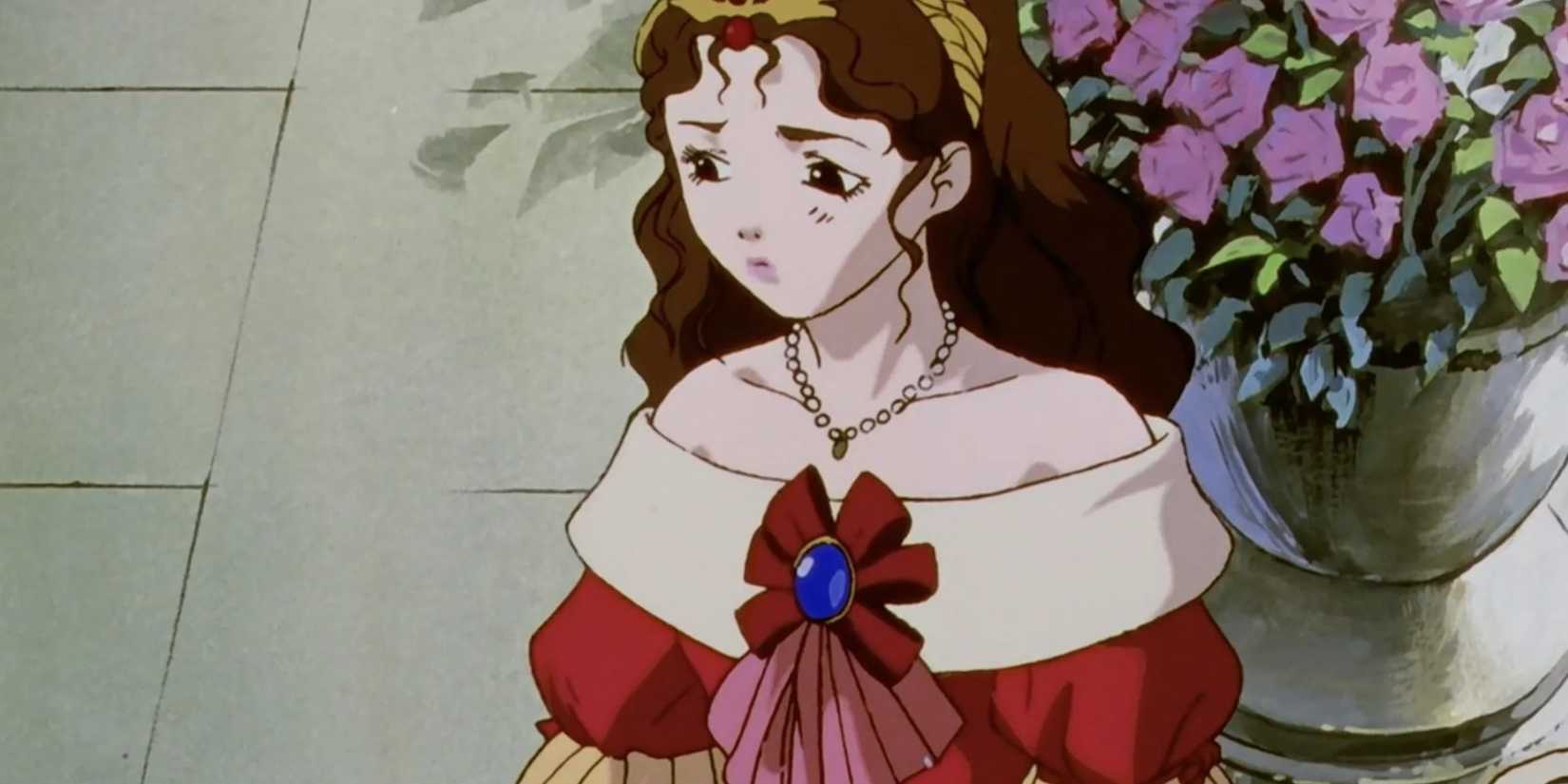 princess Charlotte is outdoors in a red gown.