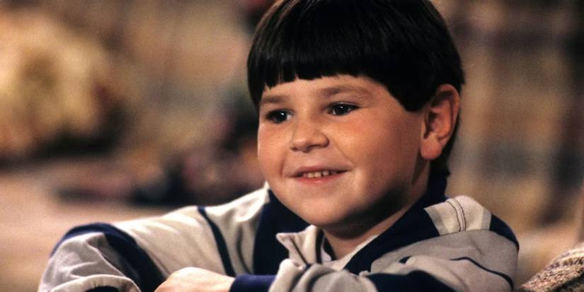 D.J. Conner smiles as a child in Roseanne