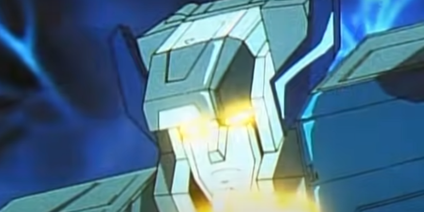 Fortress Maximus looks down with his eyes glowing in Transformers: Headmasters.