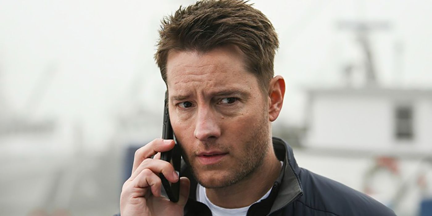 Colter Shaw, wearing a black jacket and white shirt, holds a cell phone to his ear in Tracker