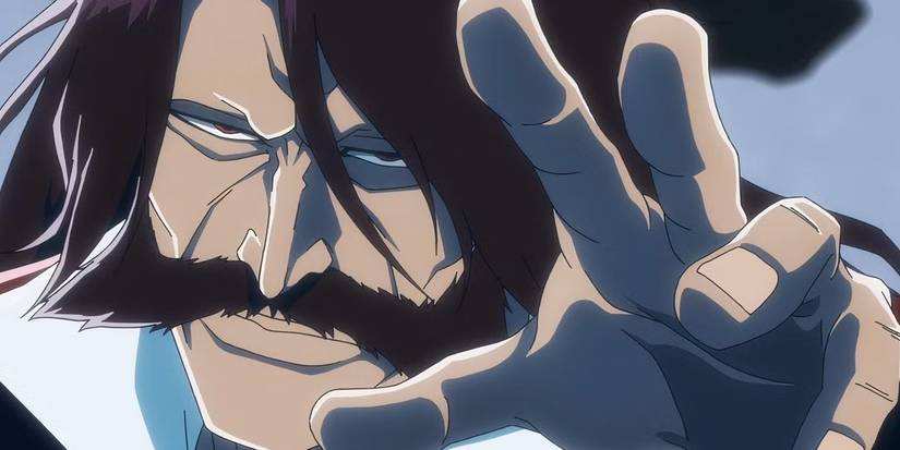 Yhwach holds his hand towards the spectator in Bleach.