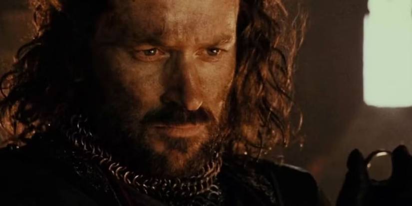 Isildur stares at the One Ring in Lord of the Rings