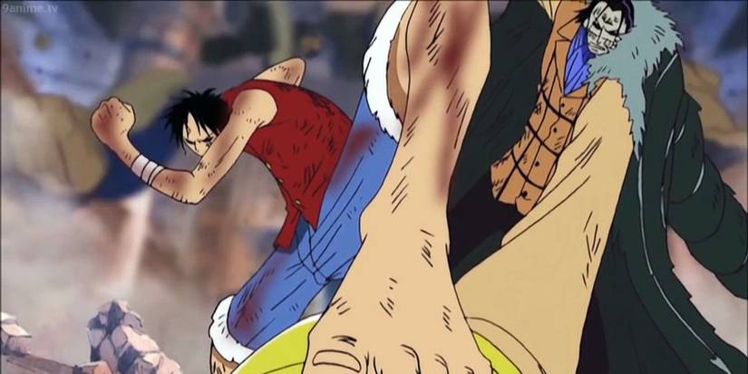 Monkey D. Luffy tient le crochet de Sir Crocodile dans l'arc Alabasta de One Piece.