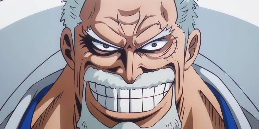 Monkey D. Garp smiles widely as he looks at the viewer - One Piece