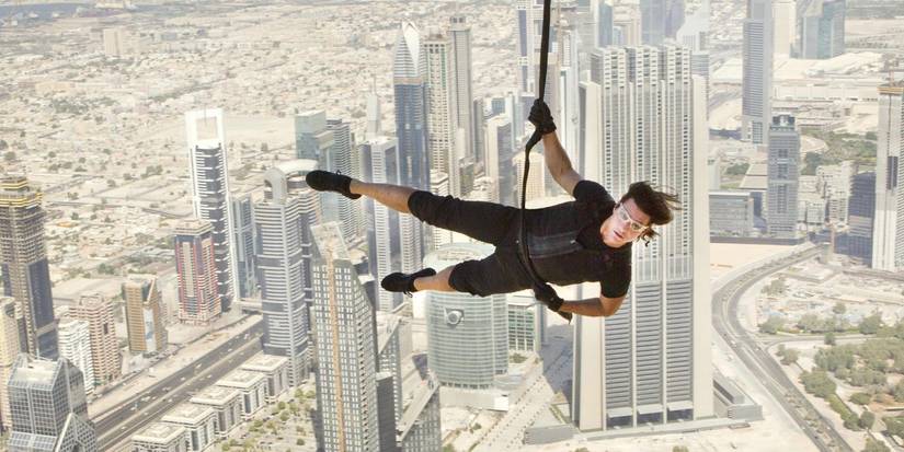Tom Cruise as Ethan Hunt swinging across the Burj Khalifa in Mission Impossible: Ghost Protocol (2011)