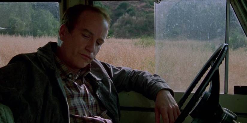 Richard Dreyfuss as Adult Gordie, sitting in his car in Stand by Me