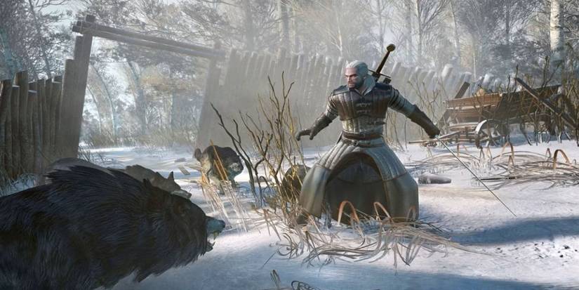 Geralt wears his Bear Armor and draws his sword in The Witcher 3 against a pack of wolves in a snowy area.