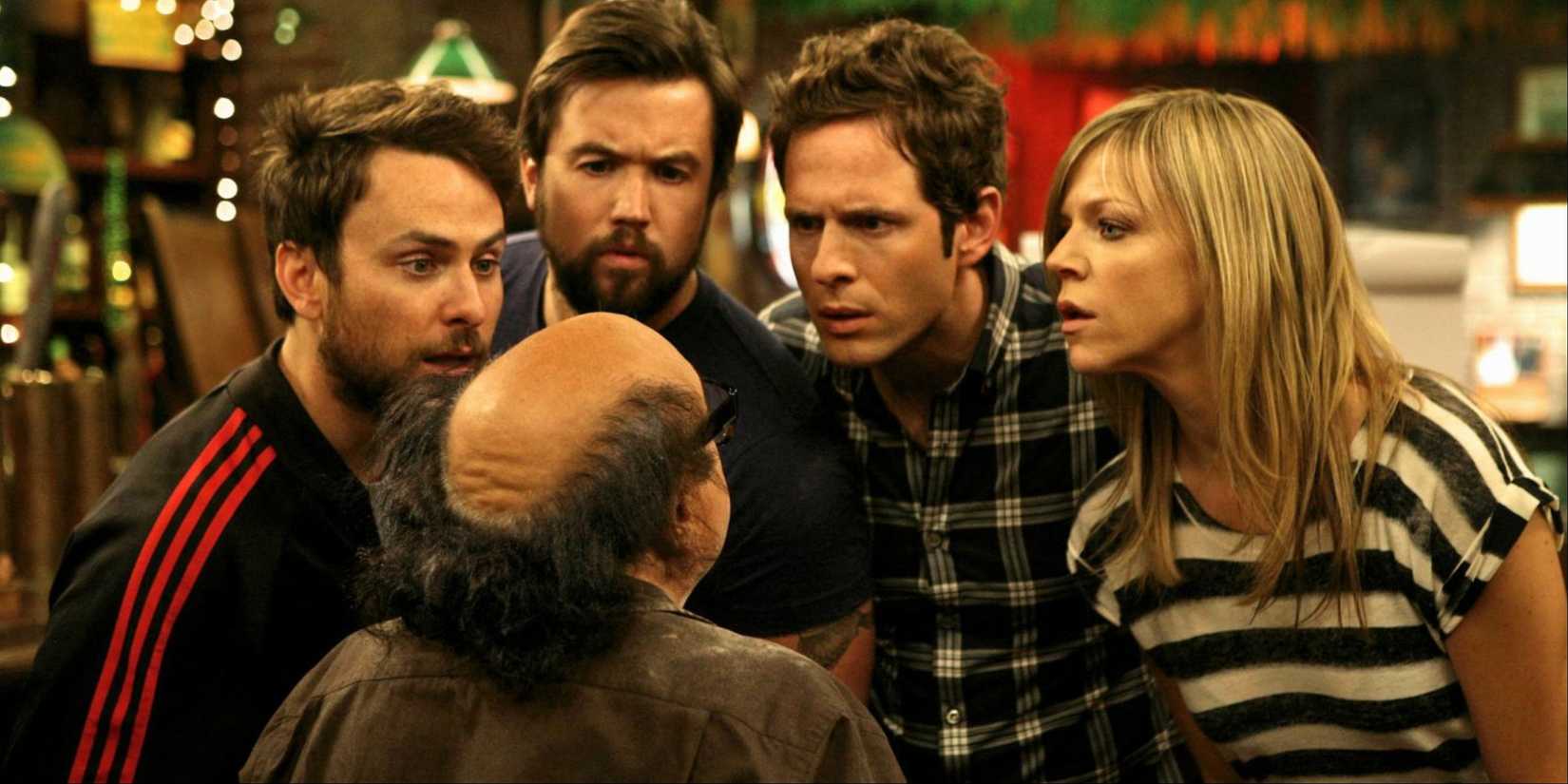Charlie, Mac, Dennis and Dee look at Frank in It's Always Sunny in Philadelphia