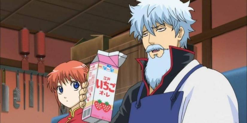 Gintoki has a beard on his face and is drinking strawberry milk while Kagura watches in Gintama.