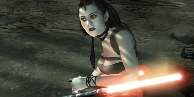 The pale-skinned Zabrak Maris Brood holding her red Tonfa lightsabers in Star Wars: The Force Unleashed.