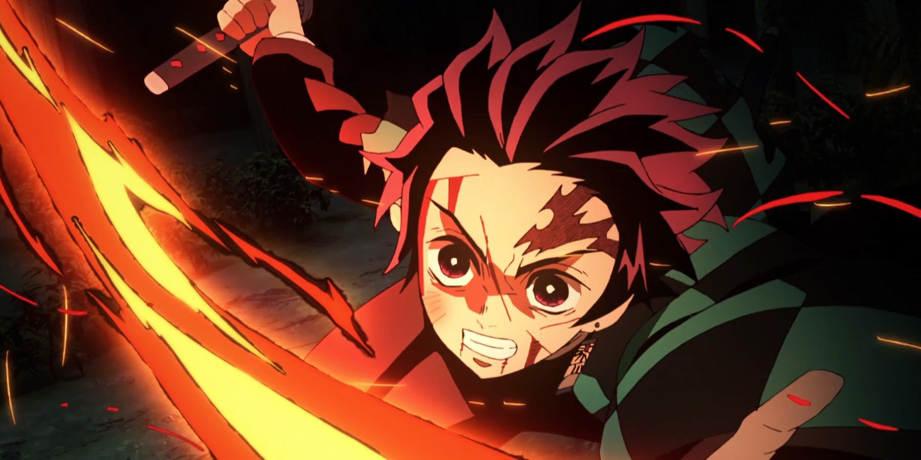 Tanjiro attacks with Hinokami Kagura in the animated series Demon Slayer