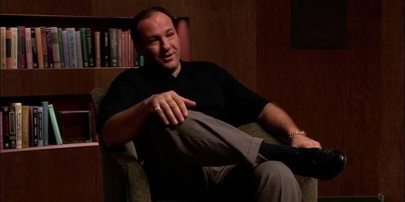 James Gandolfini as Tony Soprano seated in a therapy session of the television series The Sopranos