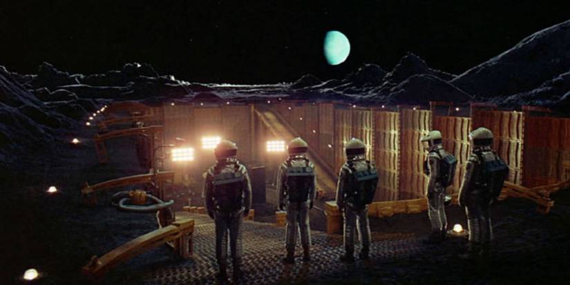 A group of astronauts staring at the monolith from the movie 2001: A Space Odyssey (1968)