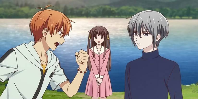 Fruits Basket Tohru is in the background while Kyo shouts in Yuki.