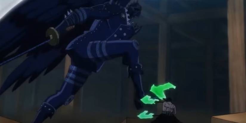 Roronoa Zoro bloque le coup de pied du roi le feu sauvage dans l'arc Wano Country de One Piece.
