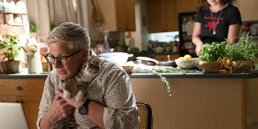 McEnany as Velma holding a cat in Tracker 'Klamath Falls'